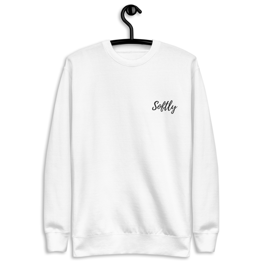 White long sleeve fleece pullover sweater with black embroidered fancy cursive text SOFTLY