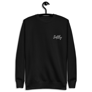Black long sleeve fleece pullover sweater with white embroidered fancy cursive text SOFTLY